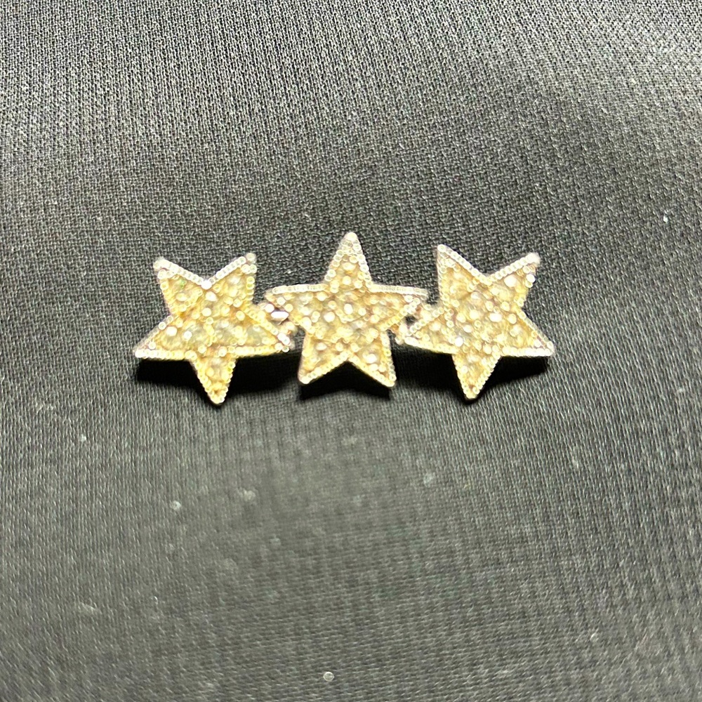 VTG Signed Silver Tone Metal and Rhinestone Star bar brooch. By Sarah Coventry.